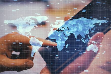 Close up of hands using tablet with digital map. Global business and interactive concept....