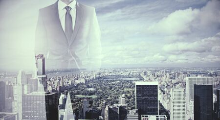 Unrecognizable businesswoman standing on blurry New York city background with copy space. Success and career concept. Double exposure  の写真素材