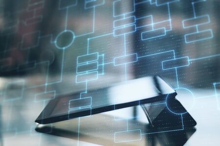 Digital tablet with glowing business algorithm. Business and communication concept.