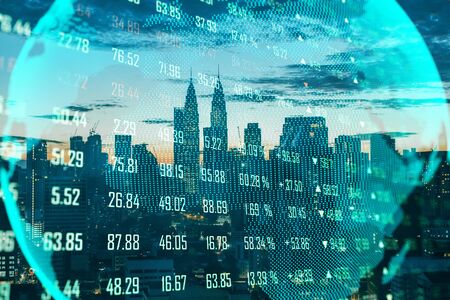 Global trading concept with digital screen. Lighting earth globe at stock chart on city  background.の写真素材