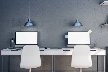 Modern designer computer with sticker on screen  in coworking office. Workplace and lifestyle concept. 3D Renderingの写真素材