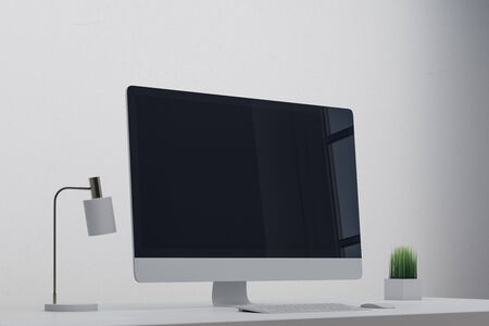 Creative designer desk with empty screen in office interior. Web design concept. Mock up, 3D Renderingの写真素材
