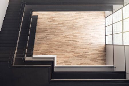 Top view modern staircase on concrete building interior. Architecture and startup concept. 3D...