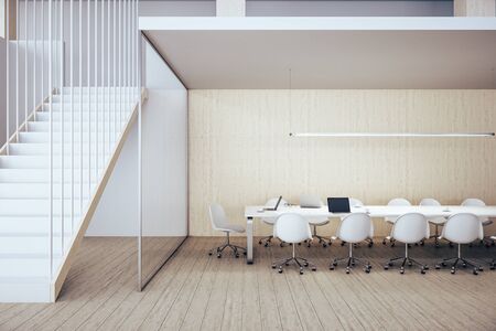 Contemporary meeting interior with stairs, laptop and equipment on table. 3D Renderingの写真素材