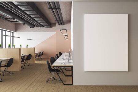 Modern coworking office interior with blank poster on wall. Workplace and corporate concept. 3D...