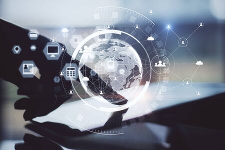 Hand using digital tablet with abstract global network interface. Business and technology concept....