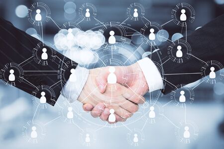 Handshake with global human resource interface and creative social network. Business and teamwork...