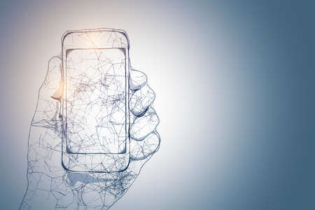 Futuristic polygonal hand holding phone with empty screen. Technology and communication concept. 3D Renderingの写真素材