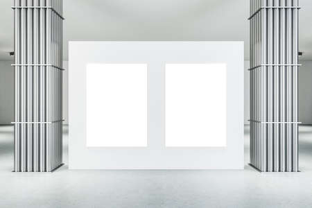 Clean gallery interior with silver pipe columns and two vertical blank posters on wall. Performance and presentation concept. Mock up. 3D Renderingの写真素材