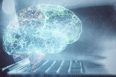 Laptop computer with abstract glowing brain hologram. Artificial intelligence and innovation...