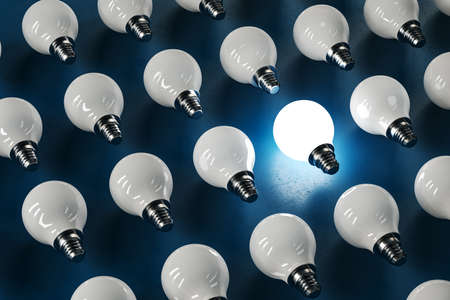 Glowing light bulb and many light bulb on blue background. Idea and leadership concept. 3D Rendering