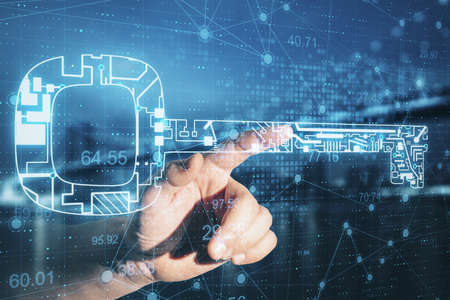 Hand using glowing circuit key hologram on city background. Safety and security concept. Multiexposureの写真素材