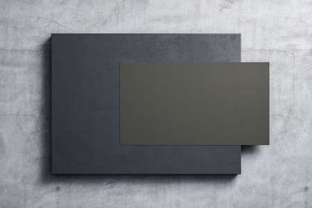 Empty black poster hanging on placard on concrete wall. Museum and exhibition concept. Mock up, 3D...