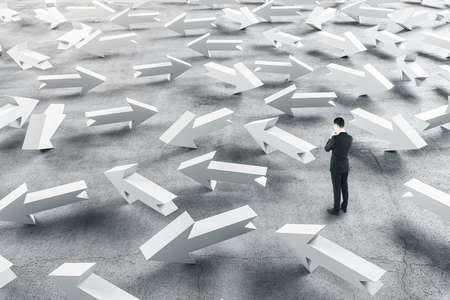 Businessman looking on group white arrows. Leadership and way conceptの写真素材