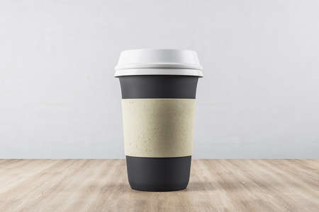 Disposable black paper cup of coffee on table. Food and drink concept. 3D Rendering