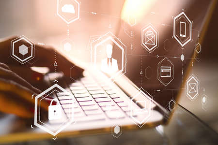Businessman hands using laptop with human resources interface. HR and analytics concept.