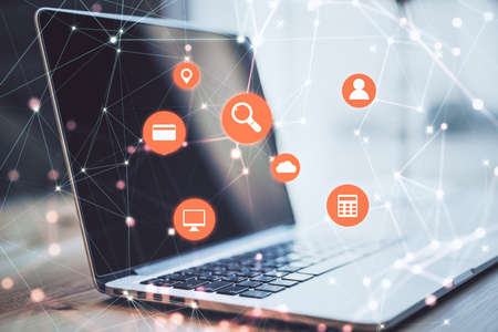 Laptop with abstract computer cloud interface. Communication and technology concept. Close upの写真素材