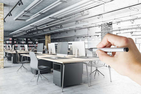 Businessman hand drawn coworking office with city view and daylight. Architecture and drawing concept.の写真素材