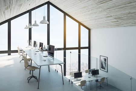 Contemporary two-story loft office interior with computers on table and megapolis city view. Occupation and working concept. 3D Renderingの写真素材