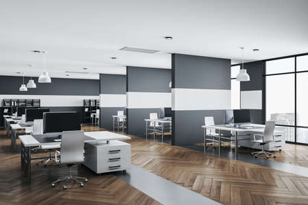 Modern office interior with rows of computer tables and city view. Workplace and company concept. 3D...