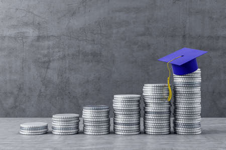 Chart of gold coins with blue graduate hat on concrete wall background. Business and education concept. 3D Renderingの写真素材
