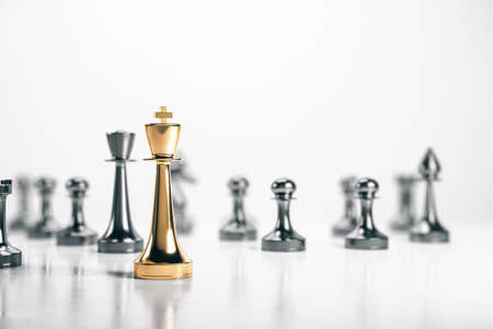 Silver chess piece and golden king. Game and challenge concept. 3d renderingの写真素材