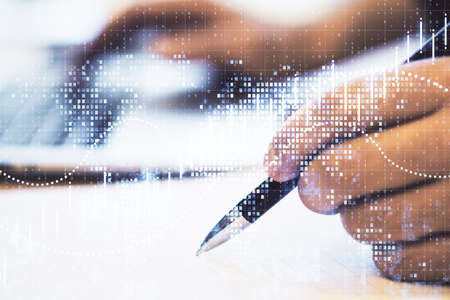 Hand with pen and business chart. Finance and trade concept. Multiexposure