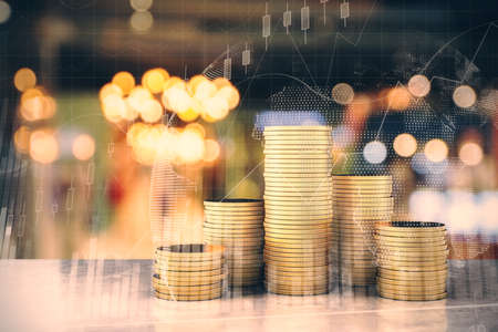 Golden coin piles with growing stock charts on virtual screen. Cash and trade concept. 3D Renderingの写真素材