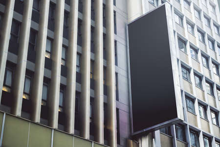 Black rectangular signboard with blank space for  the wall of a modern business center, mockupの写真素材