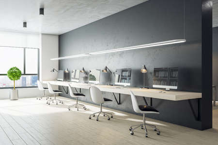 Luxury coworking office interior with long desk, computers, chair and bright city view. Workplace and company concept. 3D Renderingの写真素材