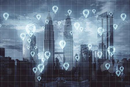 Digital geolocation interface with world map over night city. Geolocation and distributed data concept.の写真素材