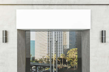 Blank white banner over glass doors with kind of modern office building. Business and architecture...