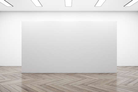 Modern concrete interior with white exhibition stand and wooden floor. Museum and exhibition concept. Mock up. 3D Renderingの写真素材