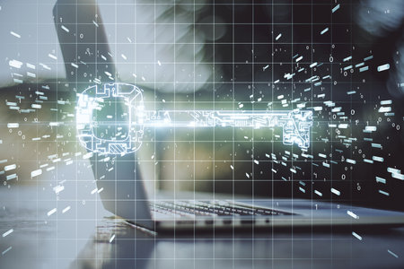 Laptop with glowing circuit key hologram. Business and security concept. Multiexposureの写真素材