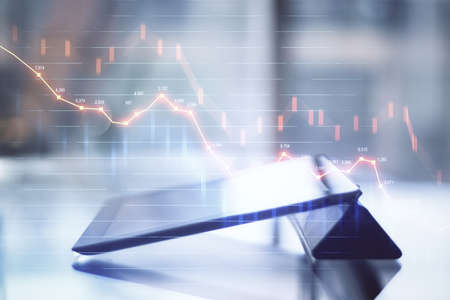 Digital tablet computer with crash stock statistics. Business and financial crisis concept. Close up