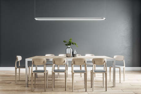 Stylish dining room interior design with modern wooden table and chairs, floor and black wall behind. 3D renderingの写真素材
