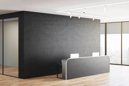 Black office lobby with a blank black wall in the background, wooden floor, a window, white ceiling, a mirror, steel desk. Mock up, 3D Renderingの写真素材