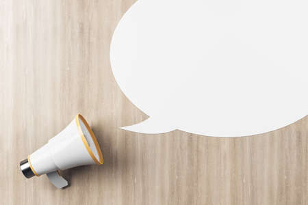 News concept with loudspeaker and white speech bubble with copyspace on wooden background. 3D...