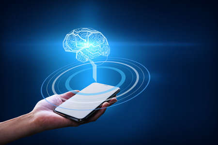 Hand with a smartphone holding a brain hologram with circles on a dark blue background, business...