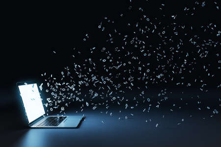 Laptop with multipe particles flow coming out from the glowing white screen on a black background,...