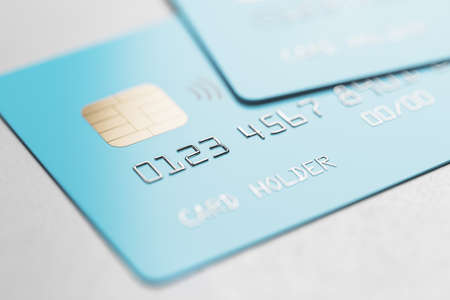Online booking concept with bblue credit cards on light background, 3D renderingの写真素材