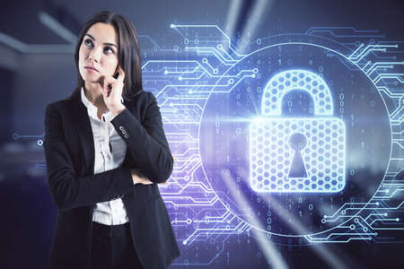 Cyber security concept with pensive businesswoman on digital screen background with circuit and hologram lock symbolの写真素材