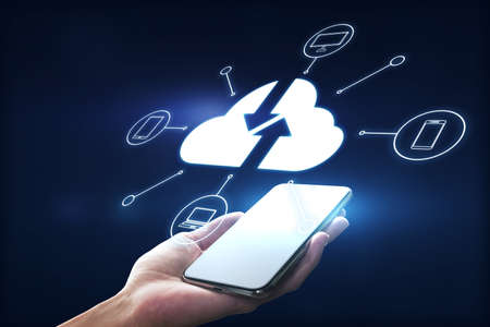 Mobile technologies concept with modern smartphone in man hand and virtual projection of cloud...