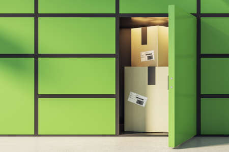 Storage facilities service concept with card boxes in green terminal cell. 3D renderingの写真素材