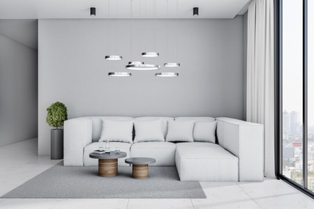 Stylish living room in cold shades interior design with light big sofa, gray carpet with coffee...