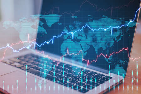 Close up of notebook on desktop with abstract forex chart and map. Fintech, trade and data exchange...