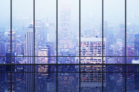 Clean panoramic window office interior with bright city view, reflections and mock up place. 3D...