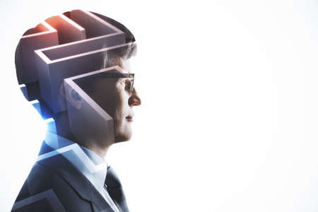 Personal development and brainstorming concept with piece of maze in businessman headの写真素材