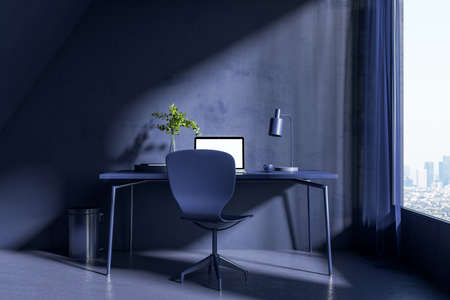 Modern blue interior with desktop and empty white laptop. Hipster home workplace. 3D Renderingの写真素材