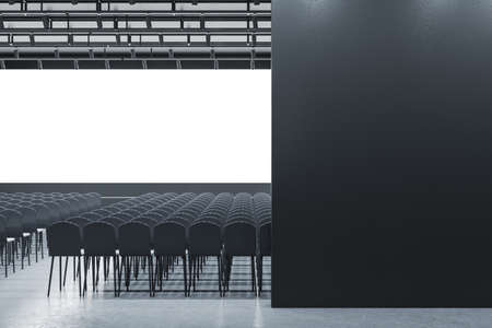 Contemporary gray auditorium with seating and empty screen with mock up place for your...